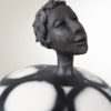 zoom tête sculpture grès Dorcasse