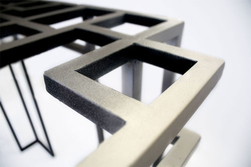 Travail de ferronnerie sur une console