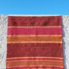 tapis pure laine Shakti exposé au soleil